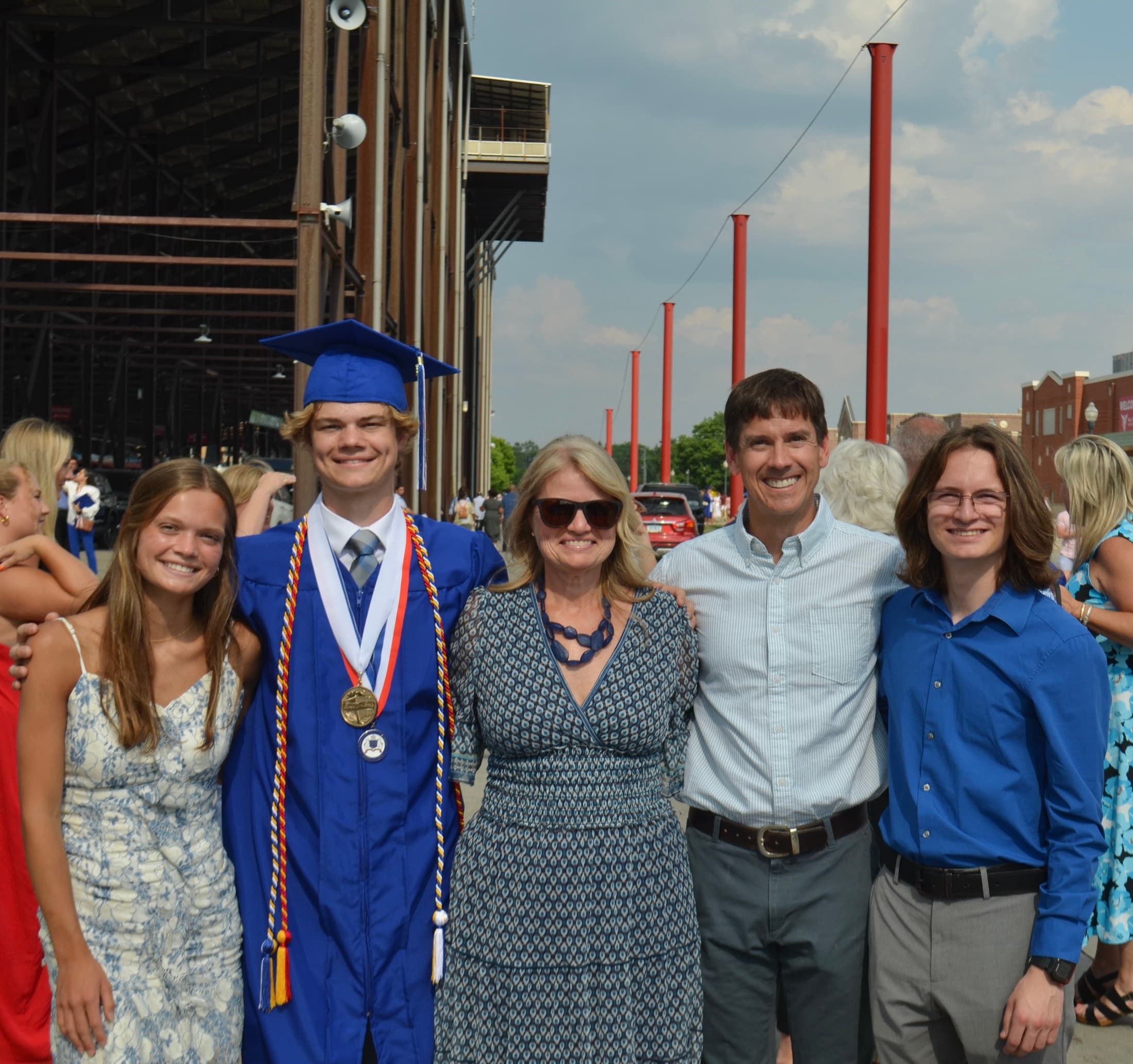 Greg Wright with his wife Charron and their three children at an HSE High School graduation